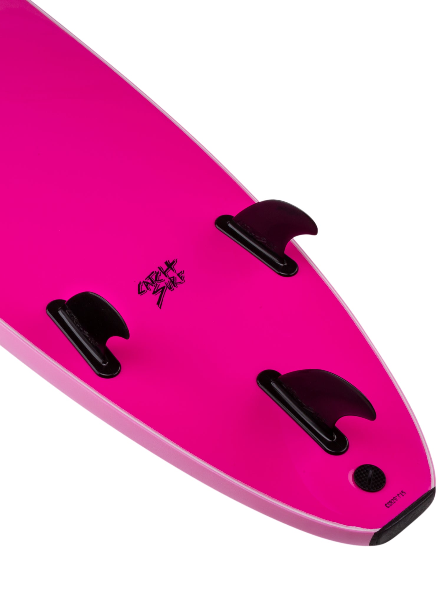 Close-up of a pink surfboard with black fins on a white background